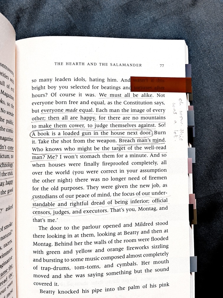 fahrenheit 451 page 77: "We must all be alike. Not everyone born free and equal, as the Constitution says, but everyone made equal. Each man the image of every other; then all are happy, for there are no mountains to make them cower, to judge themselves against. So! A book is a loaded gun in the house next door. Breach man's mind. Who knows who might be the target of the well-read man? Me?"