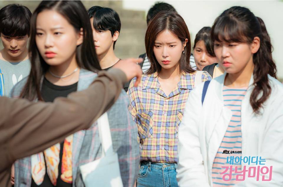 scene from my id is gangnam beauty where the freshmen are somber and tense