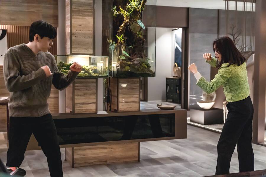 still from Love to Hate You showing Kang-ho and Mi-ran facing off in a fight