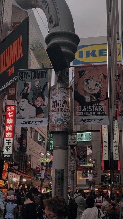 a snap of anime posters in Shibuya