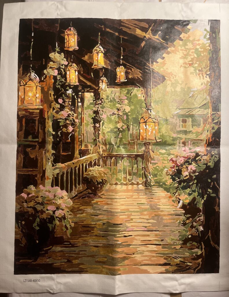 my paint-by-numbers painting of a house porch during sunset